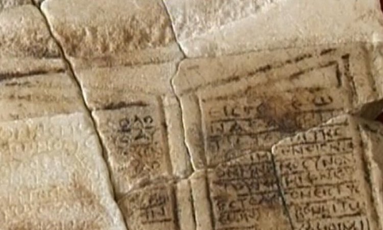 A donor’s inscription consisting of “two small pages” has been found engraved on the marble slab below the christogram.