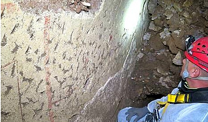A 2000-year old frescoed room has been discovered under a busy Roman street. Photo:Archaeological Superintendency Rome