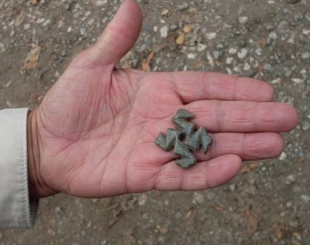 This 8,000-year-old frog-like swastika made of nephrite has been discovered during the latest archaeological excavations of the Slatina Neolithic Settlement in Bulgaria’s capital Sofia. Photo: Trud daily