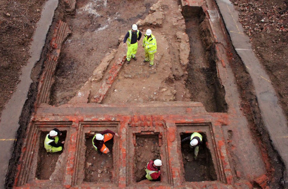 Foundations of the 20th-century brick prison built on top of medieval castle keep wall. Credits: Cotswold Archaeology