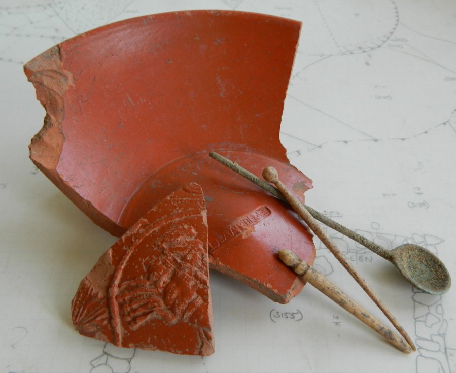 Some of the Roman artefacts discovered during the excavation – fine Samian table wares, bone hairpins and a copper spoon. Credits: University of Leicester