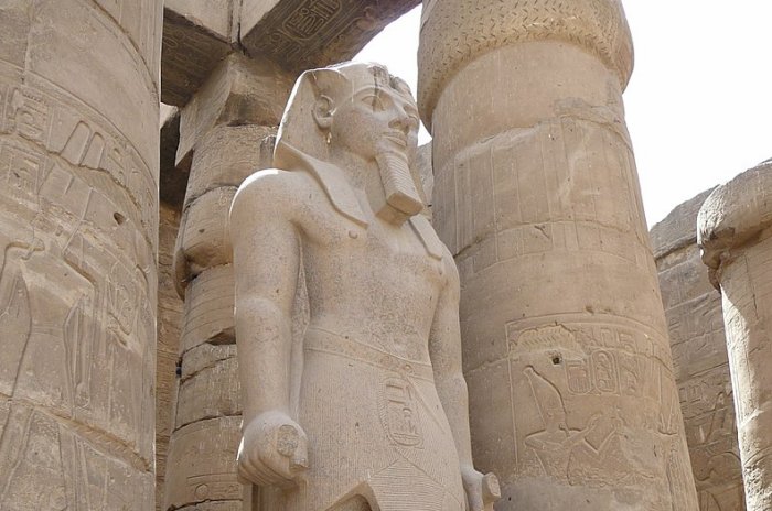 Colossal Statue of Ramses II in the first peristyle court at Luxor