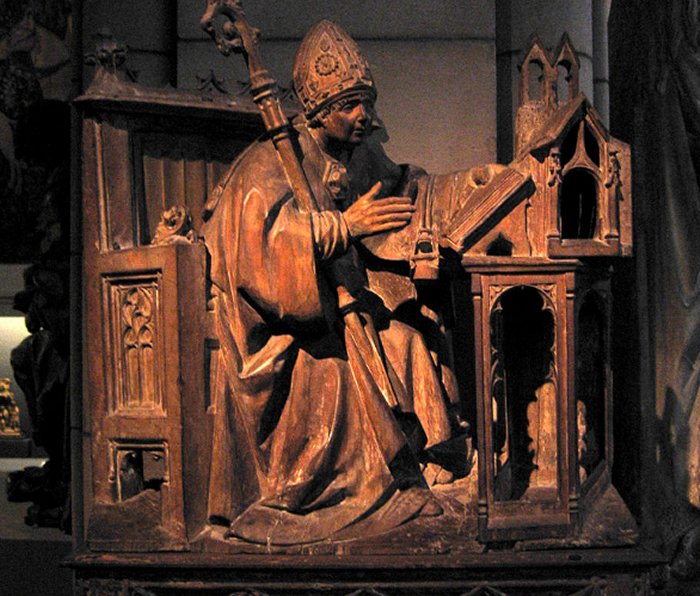 Saint Ambrose in His Study, c. 1500. Spanish, Palencia. Wood with traces of polychromy. Metropolitan Museum of Art, New York City.