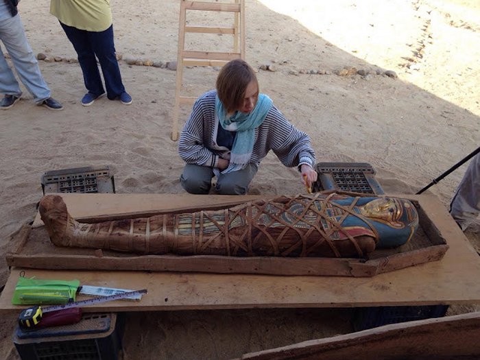 Wooden Coffin With Greco-Roman Mummy Wearing Mask Depicting Sky God Discovered In Egypt