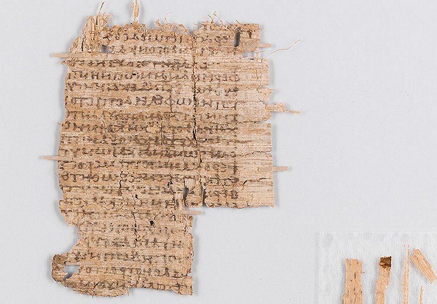1 / 3 After conservation: Cleaned, smoothed and consolidated. Because papyrus fragments are very fragile, they are mounted between two glass plates. This way, the papyrus can be easily handled and read without endangering it. (Photo: University of Basel)