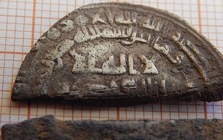 Arabic silver coins discovered in an old German cemetery near the Baltic coast.