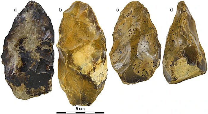 Photographs of three of the bifaces discovered during the archaeological excavation at Moulin Quignon.