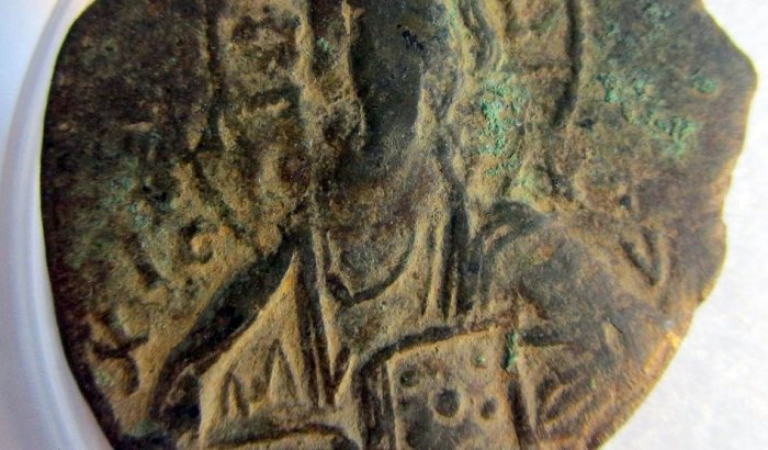 A 1000-year-old coin weighs eight grams and is 2.8 centimeters in size.