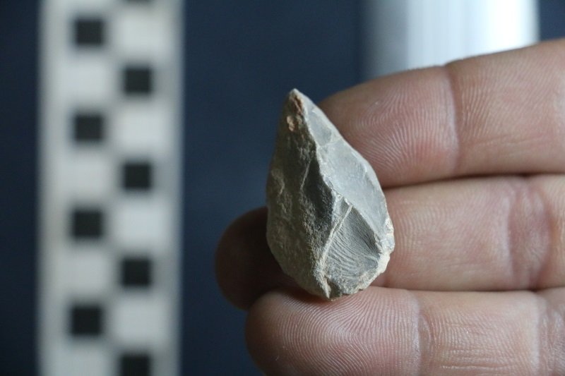 A stone tool found below the Last Glacial Maximum (LGM) layer at Chiquihuite Cave. Credit: Dr Ciprian Ardelean