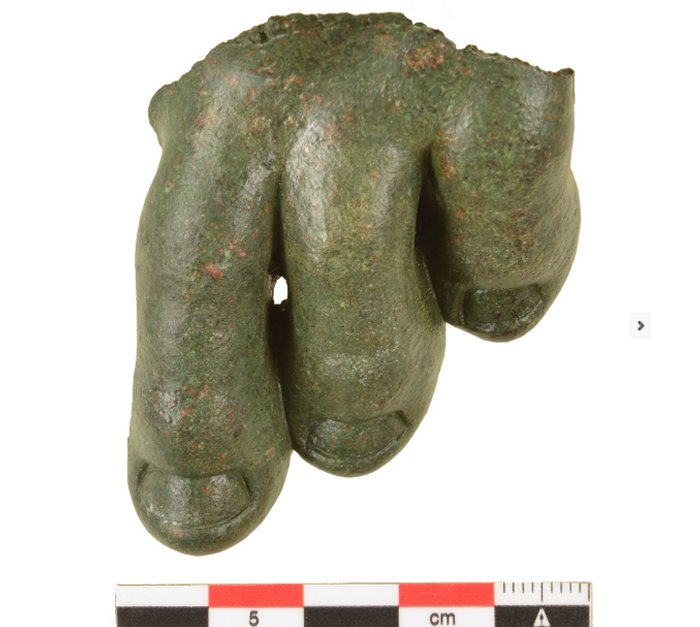 Three toes of a life-size bronze statue found in the temple area