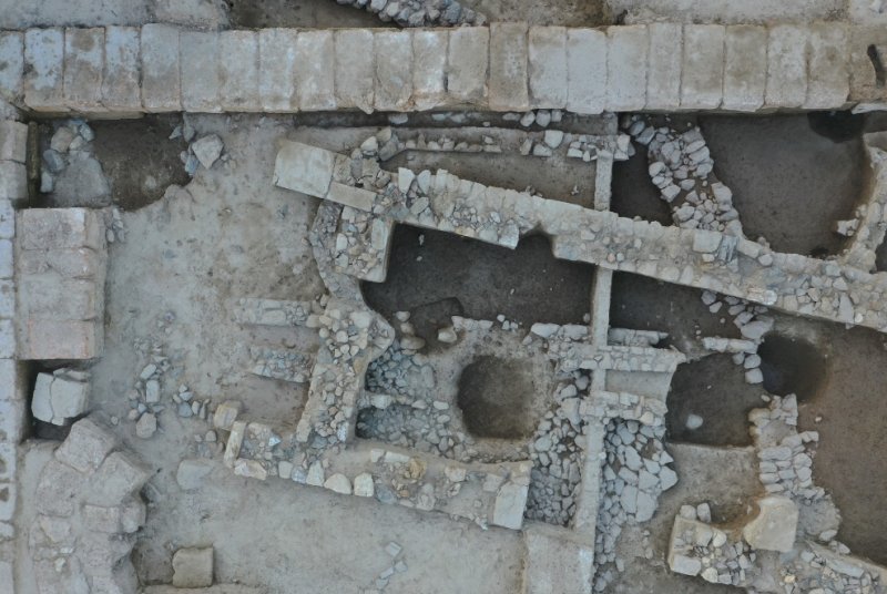 Monumental building of the Early Archaic period and in deeper layers a geometric arched building and a Late Mycenaean wall