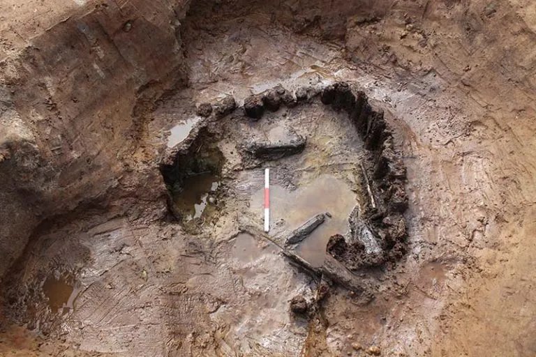 The waterlogged pit in which the axle was found. Image credit: Cotswold Archaeology Ltd.