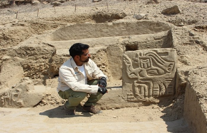Pre-Inca Temple With Colored Paintings And Carved Sculptures Discovered At The Los Paredones Archaeological Complex, Peru