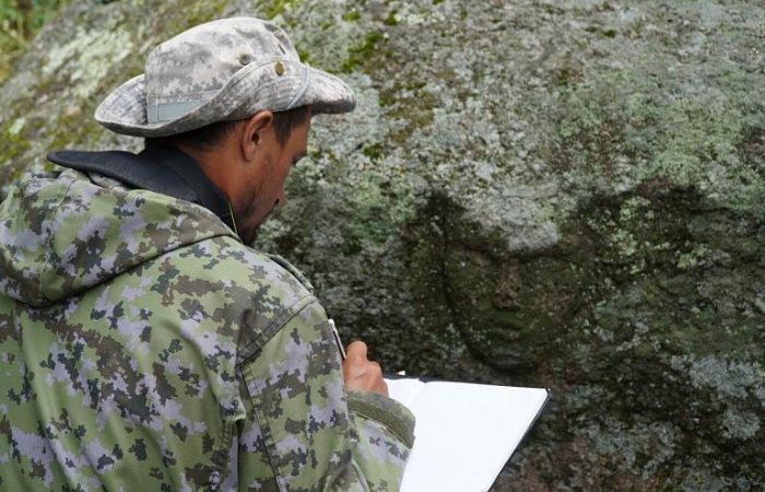 Mysterious Bronze Age Face Carved In Rock Found And Rare Artifacts Found In Kazakhstan