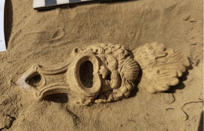 Unique Roman Oil Lamp Decorated With A Crafted Mask Discovered In The Netherlands